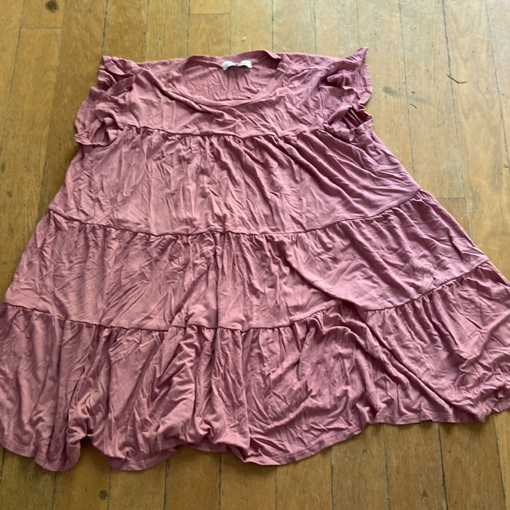 i am selling this mauve dressing shirt. it is size small in woman’s.